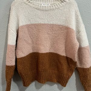 Extra small white, baby pink, and brown sweater. Vert soft. In great condition.